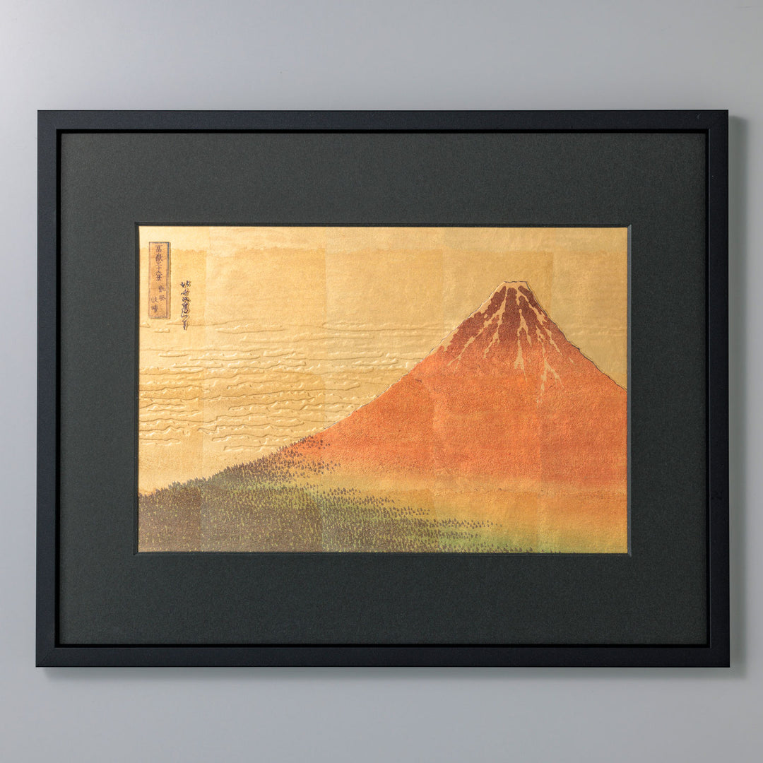 A Japanese framed foil art piece featuring ukiyo-e / red fuji. Kanazawa foil gives the artwork depth and a refined shine, making it suitable for interior decoration, home styling, personal collections, and gifts.
