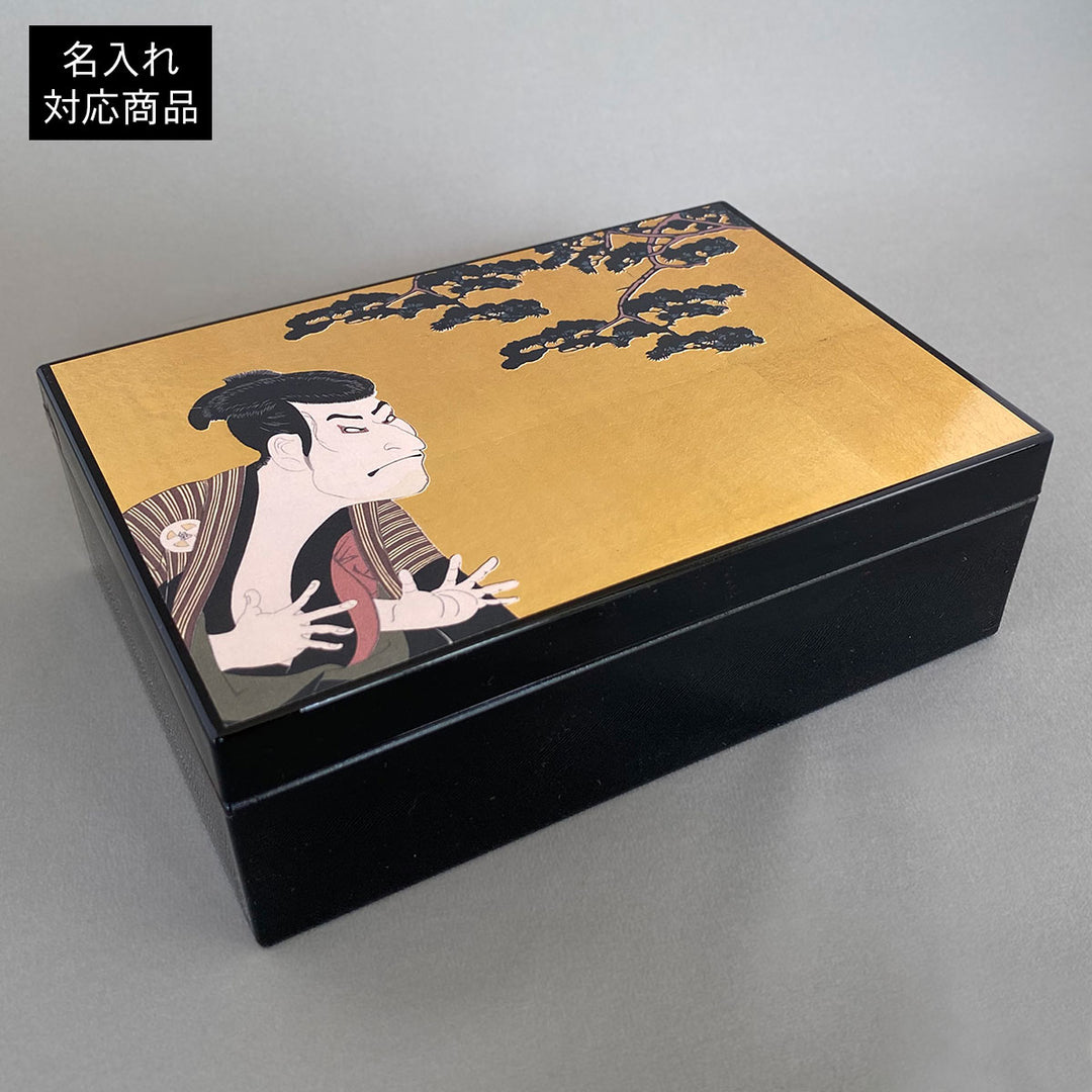 A decorative storage box with Japanese art-inspired design and foil accents. It is suitable for keeping small accessories, presenting gifts, or adding a compact Japanese craft item to gift and home interior displays.