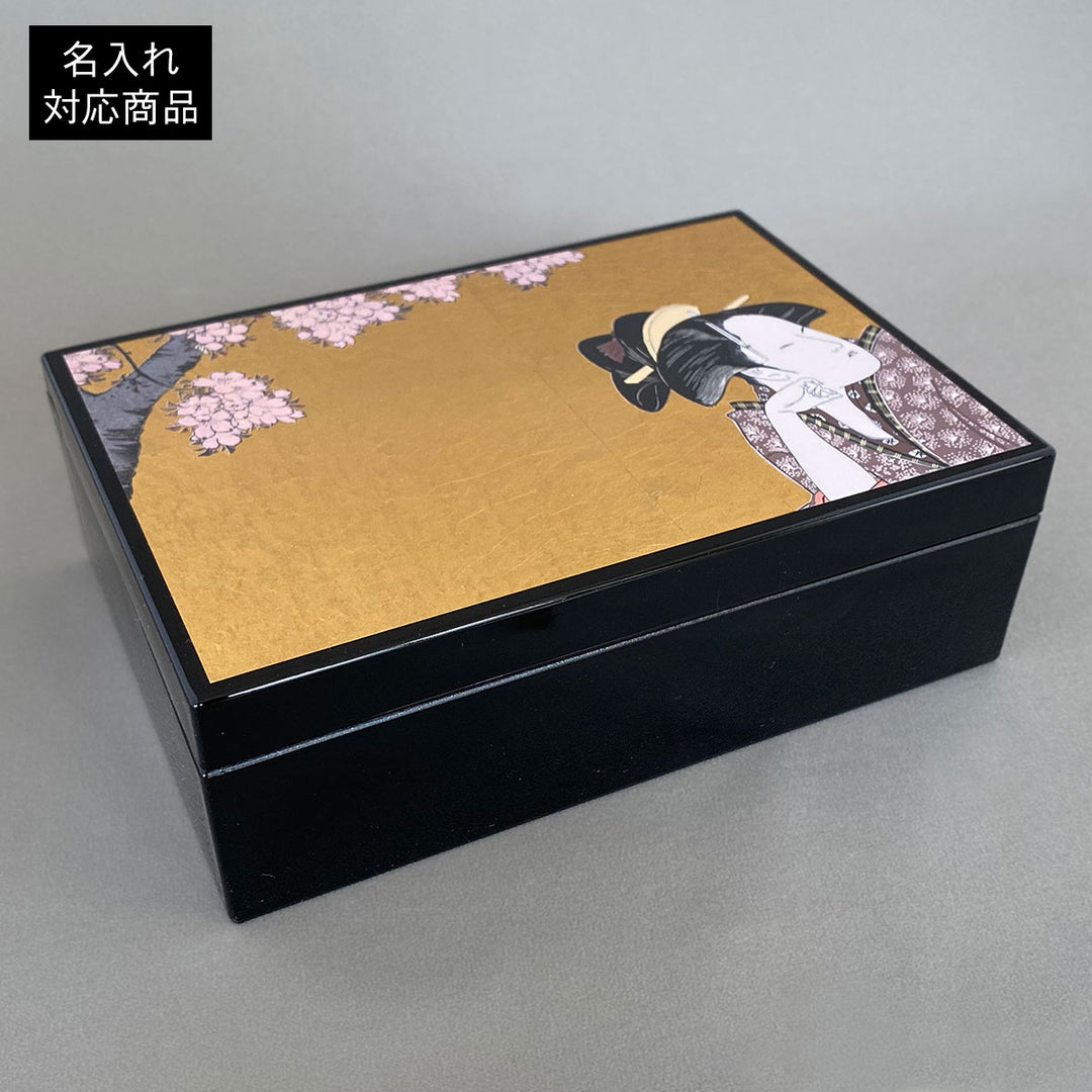 A decorative storage box with Japanese art-inspired design and foil accents. It is suitable for keeping small accessories, presenting gifts, or adding a compact Japanese craft item to gift and home interior displays.