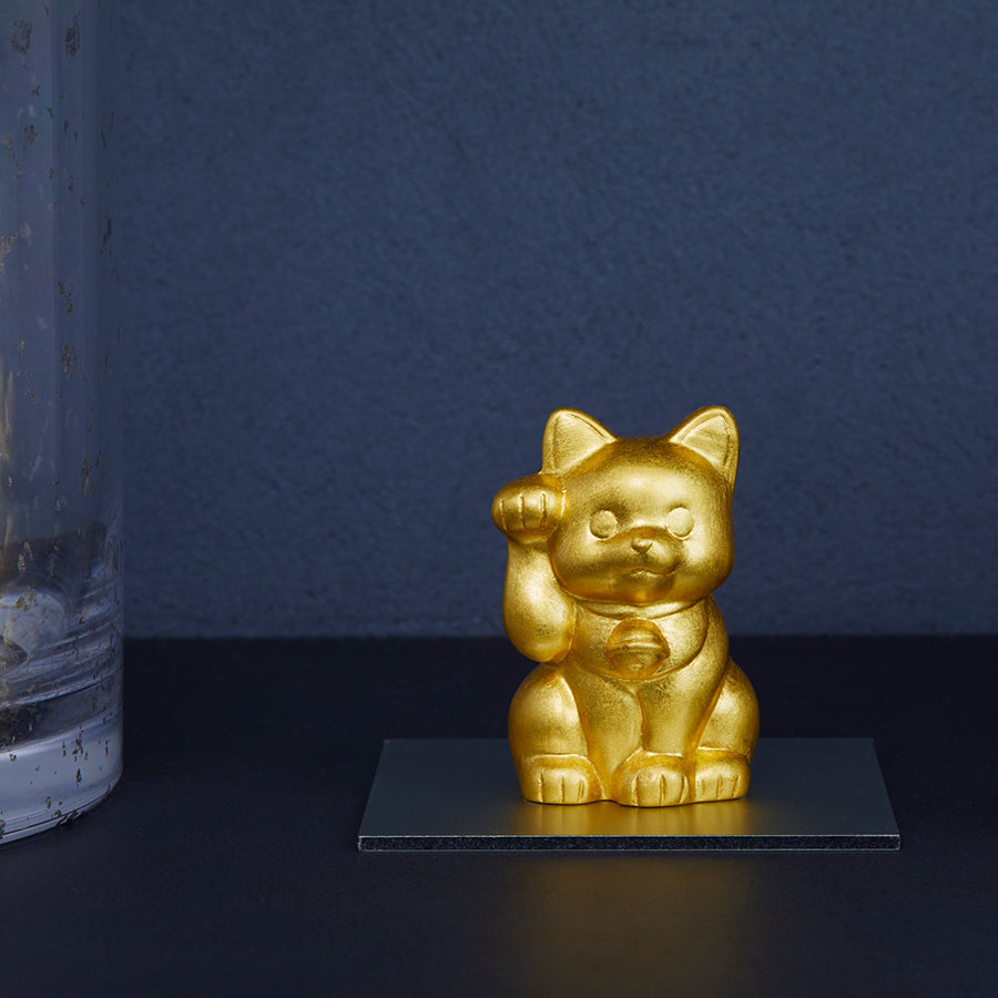 A decorative Maneki Neko lucky cat for money luck, finished with Hakuichi foil craftsmanship. It works well as a gift item, souvenir, shop display, or small interior accent connected to Japanese good-luck culture.