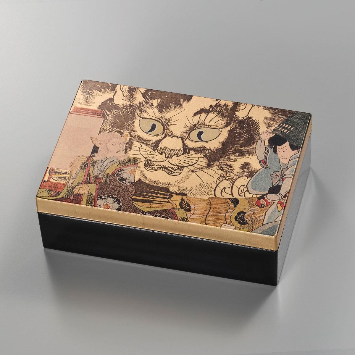 A decorative storage box with Japanese art-inspired design and foil accents. It is suitable for keeping small accessories, presenting gifts, or adding a compact Japanese craft item to gift and home interior displays.