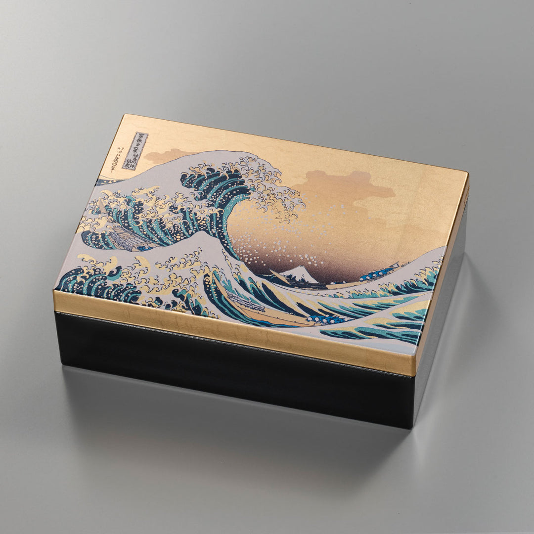 A decorative storage box with Japanese art-inspired design and foil accents. It is suitable for keeping small accessories, presenting gifts, or adding a compact Japanese craft item to gift and home interior displays.